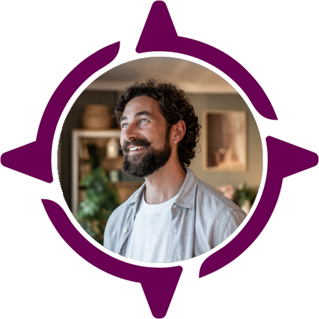 40 year old man looking optimistically out his window